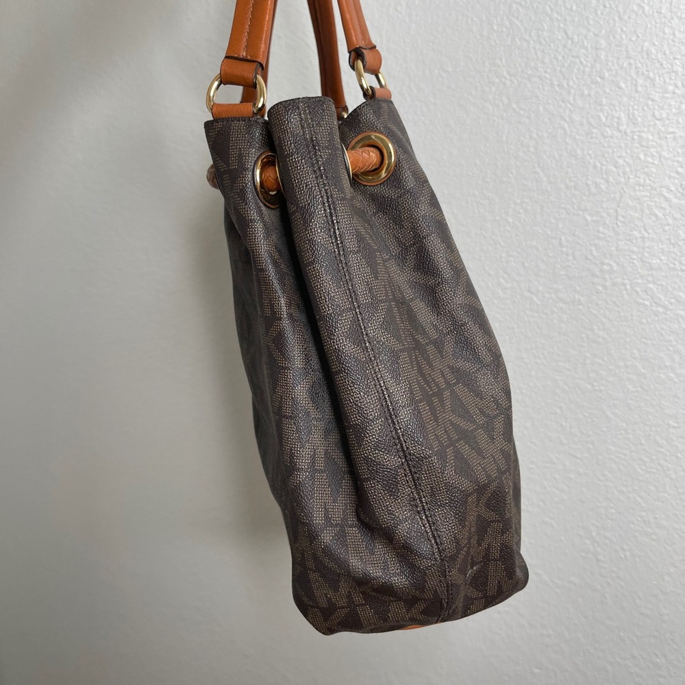 Michael Kors Brown Monogram Drawstring Shoulder Bag with Leather Tassels Gold HW - Picture 6 of 9